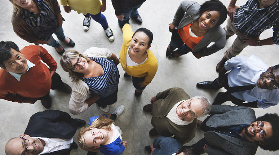 Group of diverse people looking up